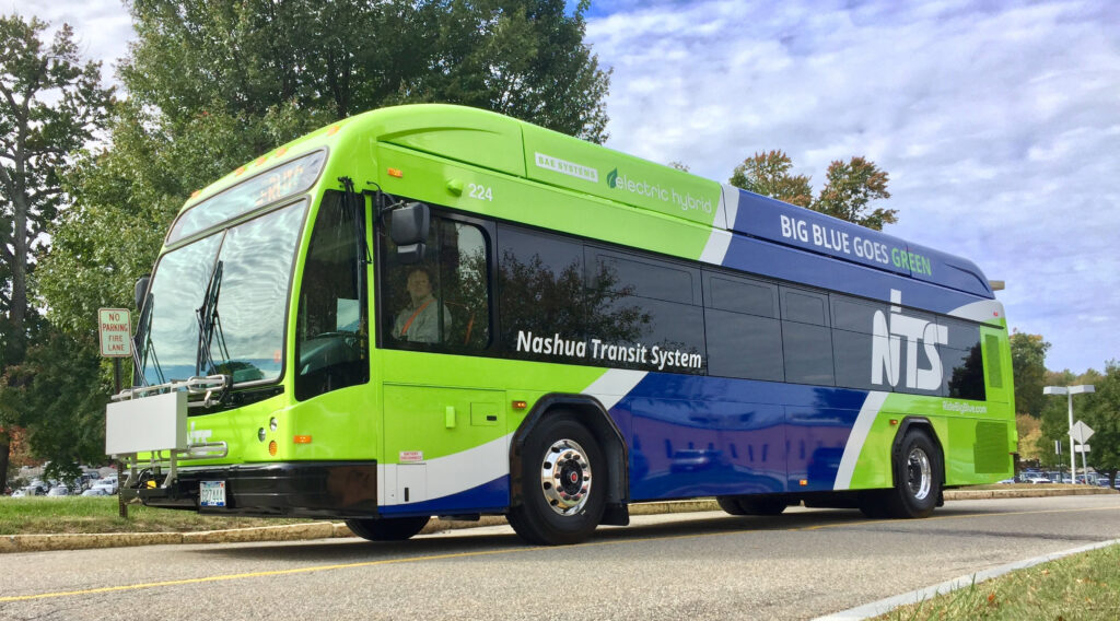 Big Blue Bus goes Green. New electric bus with lime green and blue colors.