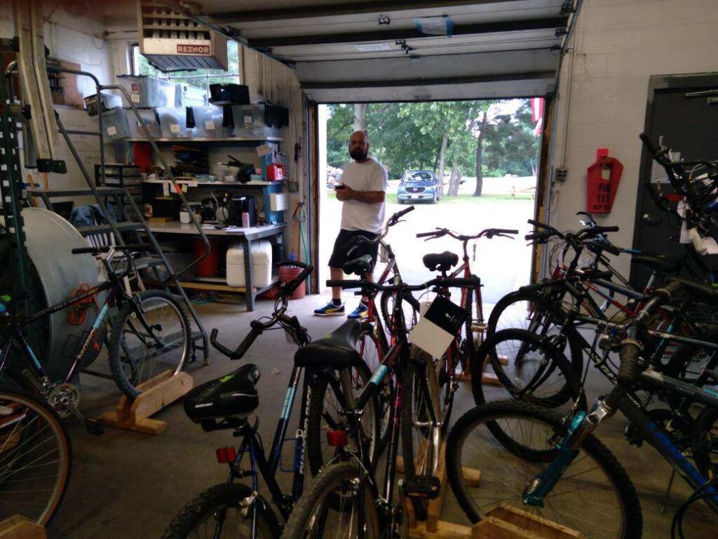 Person getting a bike at Gate City Bike Co-op